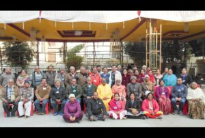 Swami Hiteshananda and Brahmachari Swarupananda with Kanpur devotees.