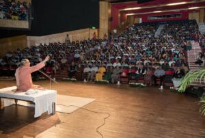 Swami Smaranananda speaks to a capacity audience in Chandigarh.