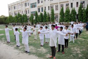 Group Energization Exercises before evening meditation.