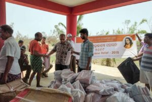 Local devotees help in the distribution.