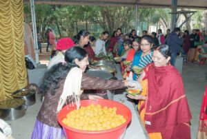 Devotees are served prasad.