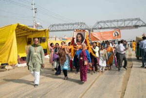 Devotees carry palanquin during Prabhat Feri.