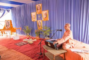 Swami Suddhananda chants during the closing programme.