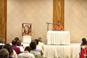 Swami Nishthananda speaks during a satsanga.