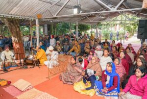 Devotees join in chanting.