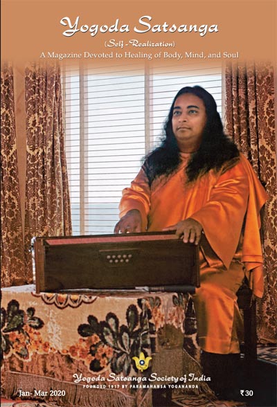 Paramahansa Yogananda playing Harmonium.