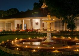 YSS Ranchi Ashram Diwali 2024 - Lamps cast gentle glow across main ashram building and fountain