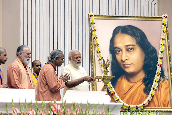 Narendra Modi lights the Diya.